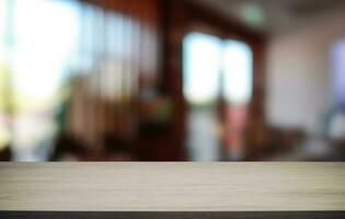 Empty wood table top and blur of out door garden background Empty wooden table space for text marketing promotion. blank wood table copy space for background photo