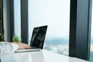 Business man working with laptop. Young business man thinking Concentrated at work. photo