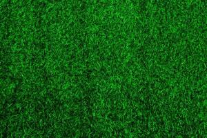 Abstract artificial green grass football field of a artificial grass background texture, Top view for background photo