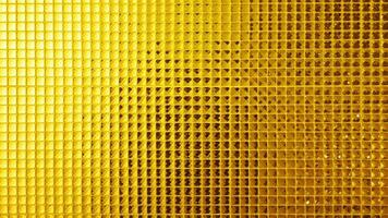 Golden yellow square mosaic for background, Wall is decorated with stained glass small plate, Beautiful mosaic wall luxurious or ceramic wall for luxurious pattern background photo