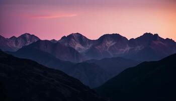 Majestic mountain range at dusk, a tranquil scene of beauty generated by AI photo