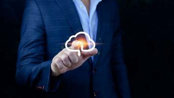 Businessman touching virtual cloud computing to transfer database. information upload, download application. Technology business transformation data concept..Big data Concept photo