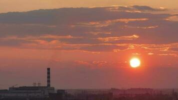 Timelapse cloudy red sunset in the city. Nightfall. Change of day and night, an overview of the city video