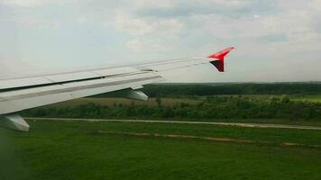 First person view from the aircraft window during landing and braking video