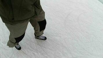 Man skating in winter, POV shot. Ice skating on frozen lake. Winter outdoor sport activities video