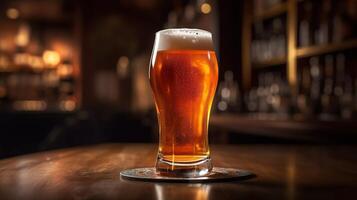 a glass of light beer with foam on a stand in a bar, defocused background. photo