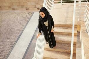 full length portrait of a muslim woman photo