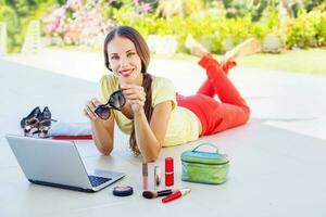 Woman doing online shopping, she received her order photo