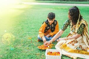 South Indian woman celebrating festival with her son photo