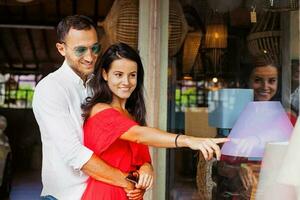 couple choosing a lamp in a shop photo