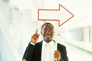 man holding arrow photo