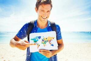 Young traveller with map photo