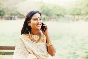 Indian businesswoman on the phone photo