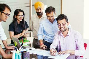 Diverse businesspeople in the office photo