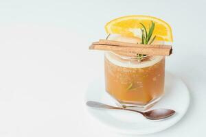 The passion fruit Mocktail serving on white table with isolated white background. photo