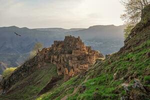 Sights of Dagestan. Abandoned ethnic aul. Old abandoned ghost town of Gamsutl, Dagestan, Russia. photo