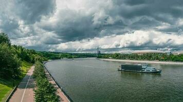 Russia, Moscow, July,31 2020. Tourist ship floating on the river. Panoramic view of the Moscow river and Sparrow hills. photo