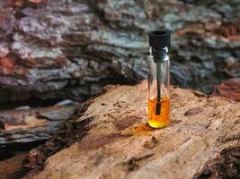 Arab oud perfume, attar in a mini bottle photo