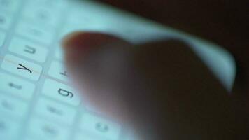 Female hands typing text on smartphone close-up. Using smartphone close up in the evening video