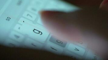 Female hands typing text on smartphone close-up. Using smartphone close up in the evening video