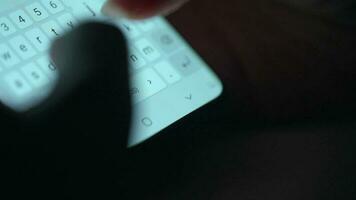 Female hands typing text on smartphone close-up. Using smartphone close up in the evening video