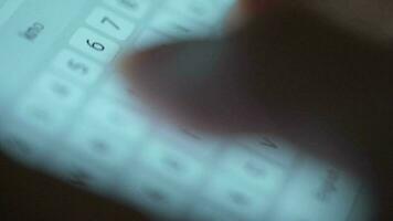 Female hands typing text on smartphone close-up. Using smartphone close up in the evening video