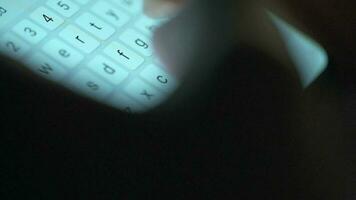 Female hands typing text on smartphone close-up. Using smartphone close up in the evening video