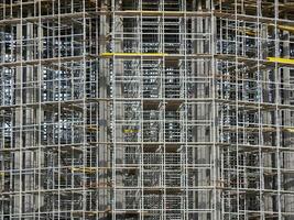 The large building in construction formwork. Aluminum alloy formwork for construction photo