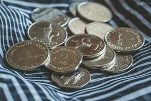 Arabic dirhams coins and banknotes photo