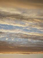 Gradient of the evening sky. Colorful cloudy sky at sunset. Sky texture, abstract nature background, soft focus photo