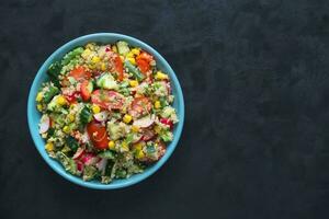 Salad with quinoa and fresh vegetables photo
