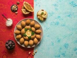 Arabic kebab. Meat cutlets on a plate. photo