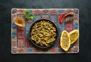 Beef Masala Curry. Kerala style meat curry. Top view. photo