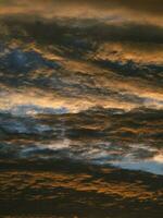 Abstract texture of a dramatic red sky with clouds photo