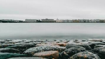 Grey late autumn panoramic view of Saint Petersburg. Neva river, long exposure. photo