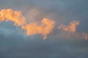 Pink smoke on the background of evening smoke. Abstract background with colored smoke. photo