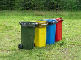 Multi-colored containers for separate garbage collection photo