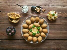 Arabic kebab. Meat cutlets on a plate. photo