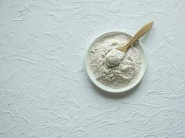 protein in a wooden spoon photo