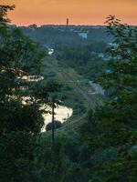 Bend rail railway aerial view. Railroad top view in the evening photo