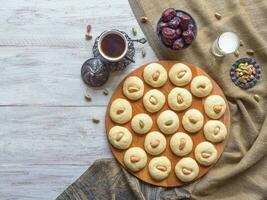 Arabic holiday cookies, kopi space on the table photo