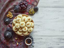 Arabic holiday cookies, kopi space on the table photo