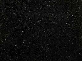 estrellas en un negro cielo, resumen negro antecedentes con blanco puntos foto