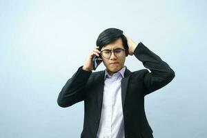 Portrait of businessman talking on phone. photo