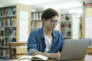 Student studying at library. photo