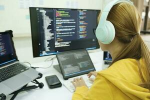 Close up programmer is coding and programming software. photo