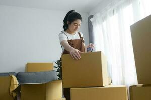 Modern female people in moving home apartment leisure indoor activity alone. photo