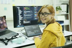 Programmer is coding and programming software. photo