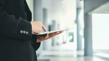 Young businessman using tablet. photo