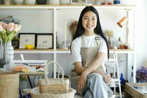 Portrait of confident woman arms crossed smiling at camera. photo